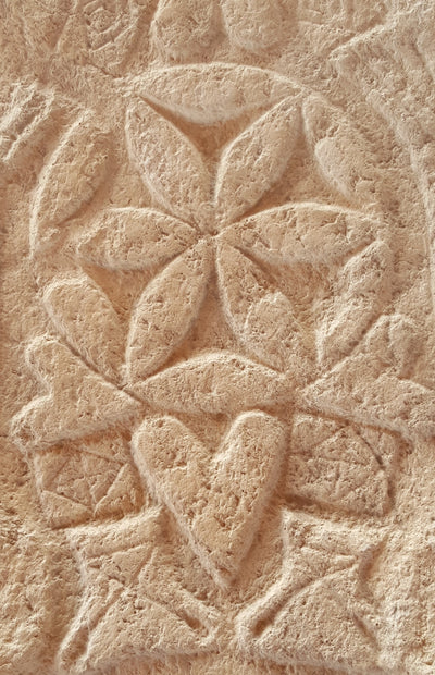 original rosette found in the magdala stone 