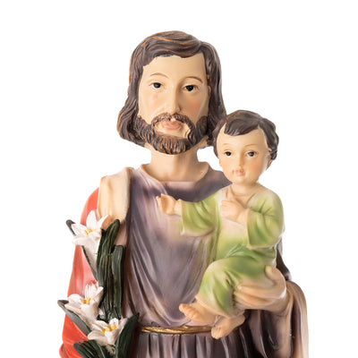 Escultura de cerámica de San José y el Niño Jesús